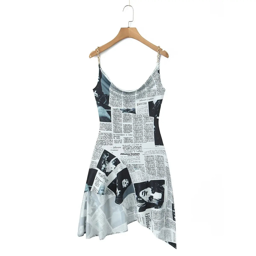 YENKYE New Women Newspaper Letter Print Irregular Hem Sling Dresses Fashion Backless Thin Straps With Chain Summer Sexy Dress