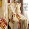 High End Floral Slimming Dress for Women's Spring and Summer 2025 New Print V-neck Oversized Vacation Long Skirt Over the Knee